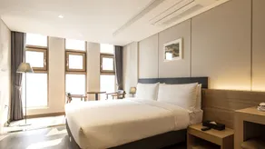 The First Stay Hotel - Room