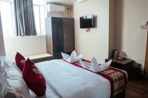 Kusum Airport Hotel - Zimmer