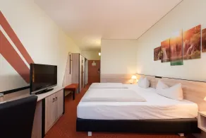 NOVINA HOTEL Südwestpark - Chambre