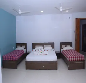 Mangalam Residency - Værelse