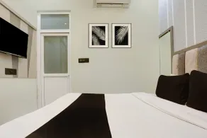 Super Hotel O Maharshi Valmiki Airport  - Habitación
