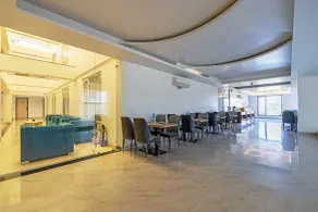 Hotel Holiday Grand - Restaurant