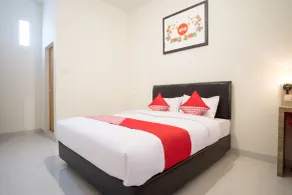 Capital O 873 Kamani Homestay Syariah - Room