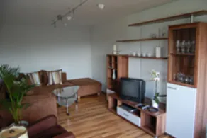 Kinderfreundliche Ferienwohnung mit Terrasse, Grill und Garten | Bergblick - Wohnzimmer