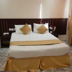 Taj Al Zahabiya Hotel - Zimmer