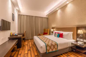 Divine Clarks Inn Suites - Habitación
