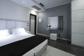 Atmosphere Suite Hotel - Zimmer
