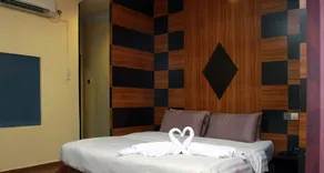 Miico Hotel Permas Jaya - Chambre