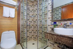 Guilin Gunanmen Hotel - Badezimmer