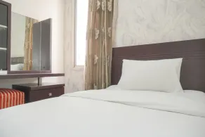 Nice and Elegant 2BR at Marina Ancol Apartment By Travelio - Værelse
