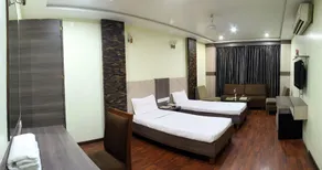 hotel puneet international - Chambre
