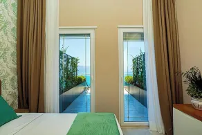 Toto Hotel & Apartments - Chambre