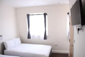 Daisy Hotel - Habitación