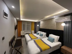 Ulu City Hotel - Værelse