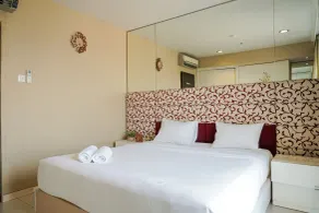 Trendy & Relaxing 2BR at The Suite Metro Apartment By Travelio - Room