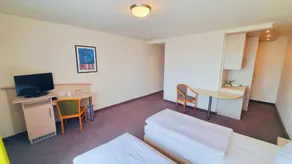 Panorama Inn Hotel und Boardinghaus - Chambre
