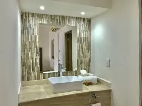 Beach and Ocean Front Apartments Cancun - Badezimmer