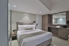 Hotel The Grand Suites - Chambre