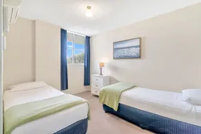 Tradewinds Apartments - Zimmer