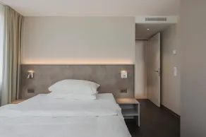 Amanthos Living Zürich Airport - Chambre