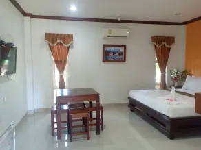 Capital O 75415 Nanthachart Riverview Resort - Zimmer