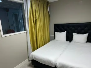 Camp-Inn Hotel - Chambre