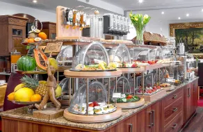 TIPTOP Hotel Burgschmiet Garni - Restaurant