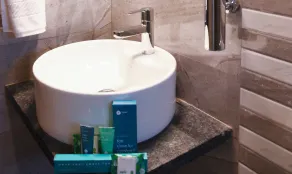 Treebo Malhaar Regency - Bathroom