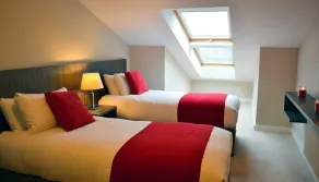 Carrick Plaza Suites and Apartments - Room