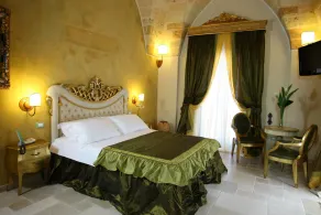 Kelina Charme Hotel by Cantine Due Palme - Habitación