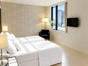 LM Hotel - Zimmer