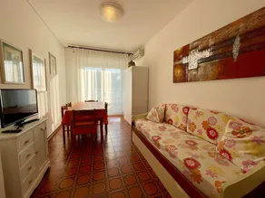 Relax in a flat with pool - Living room