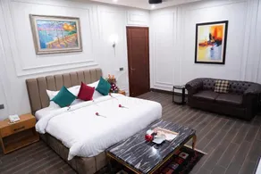 Hotel Elegant Executive Suites - Zimmer