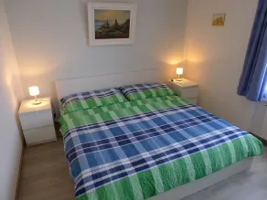 Appartamento con ampio terrazzo e vista lago e monti - Camera