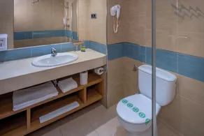 Caprici Beach Hotel & Spa - Bad