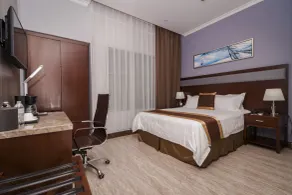 Hotel City Plaza & Suites - Room