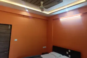 NEW SURYA DELUXE BOARDING AND LODGING - Rum