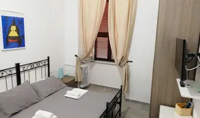 Grandis Rooms - Camera