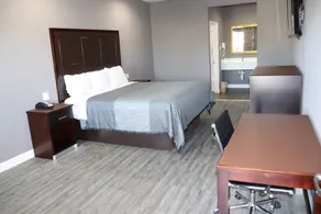 Atlantis Inn Suites - Zimmer