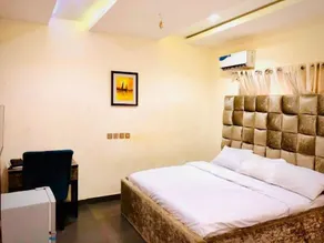 Mace Hotel and Apartments - Habitación