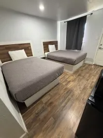 Best Budget Inn - Quarto