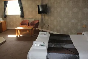 The Windmill Hotel - Habitación
