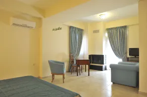 Porto Mani Suites - Chambre
