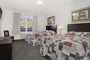 Guest House Inn & Suites - Zimmer