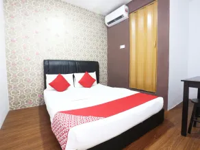 OYO 717 Mr J Hotel Wakaf Che Yeh 2 - Zimmer