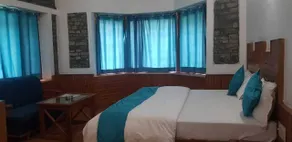 Hotel Devlok International - Zimmer