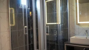 Bloom Suite Hotel - Bathroom