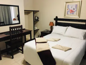 Zaks Place Hotel - Habitación