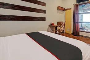 Capital O 92276 Hotel Pesona Gunung - Habitación