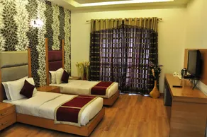 Hari's Court Inns & Hotels - Vue de la chambre